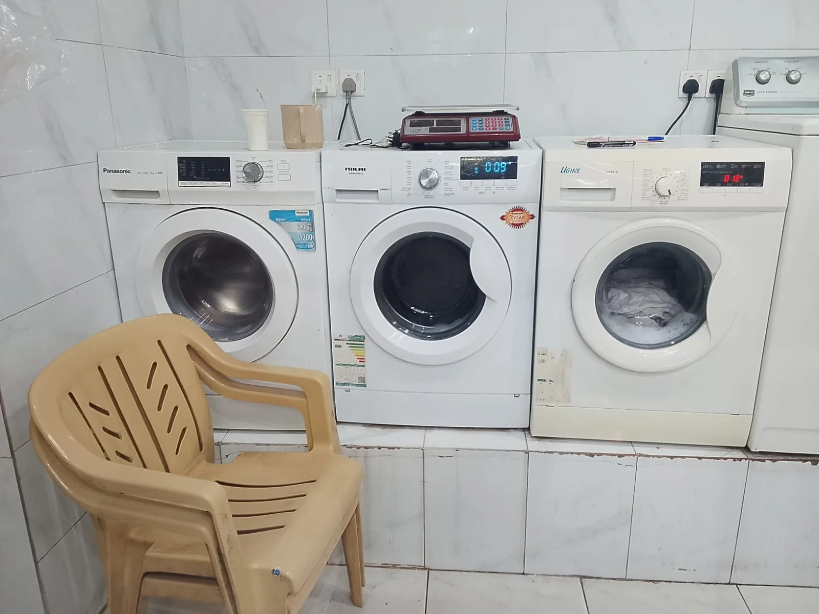 Washing machines inside the laundry